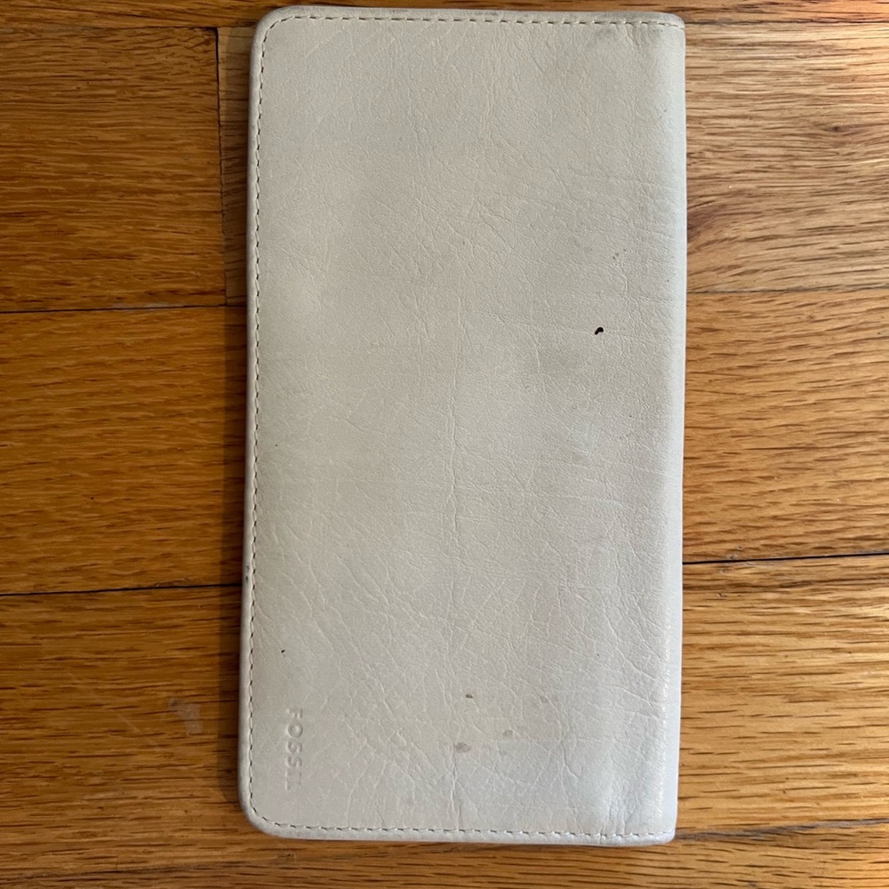 Fossil leather check carrier